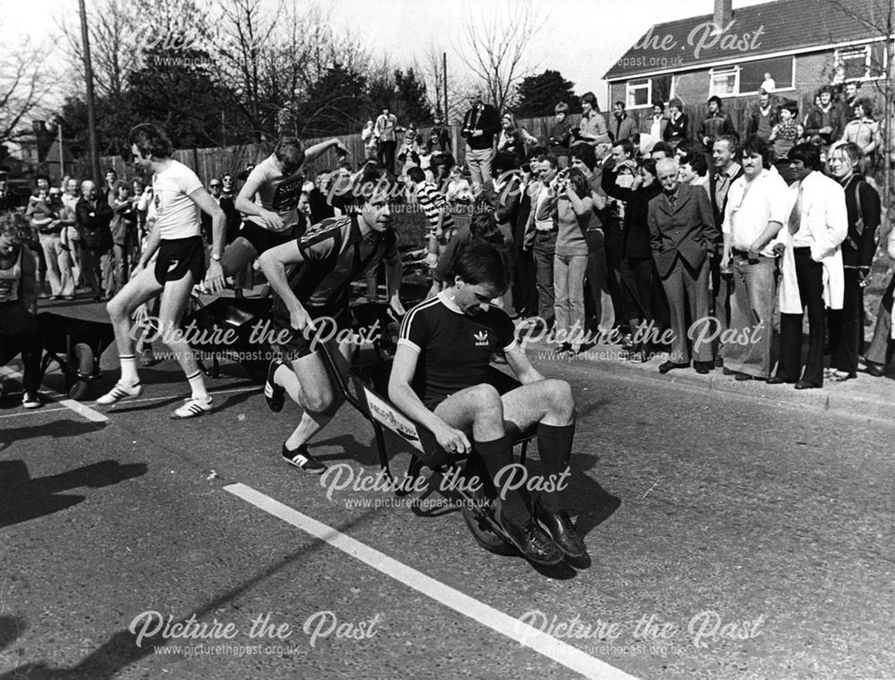 Easter Monday Wheelbarrow Race - Spills near to the start