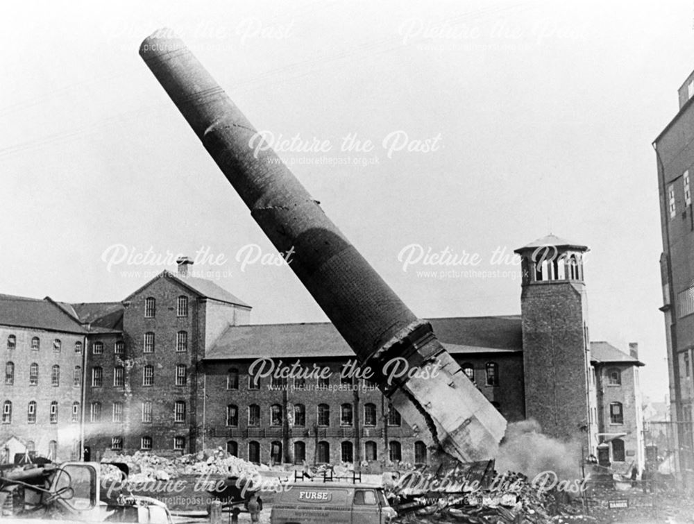 A 125 feet chimney at Derby Power Station crashing down