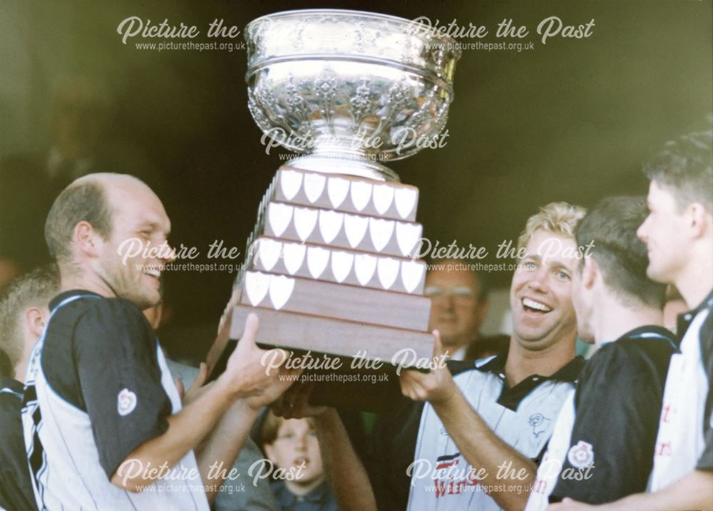 Richard Goulooze and Simon Coleman of Derby County FC with the Bass Charity Vase, 1993