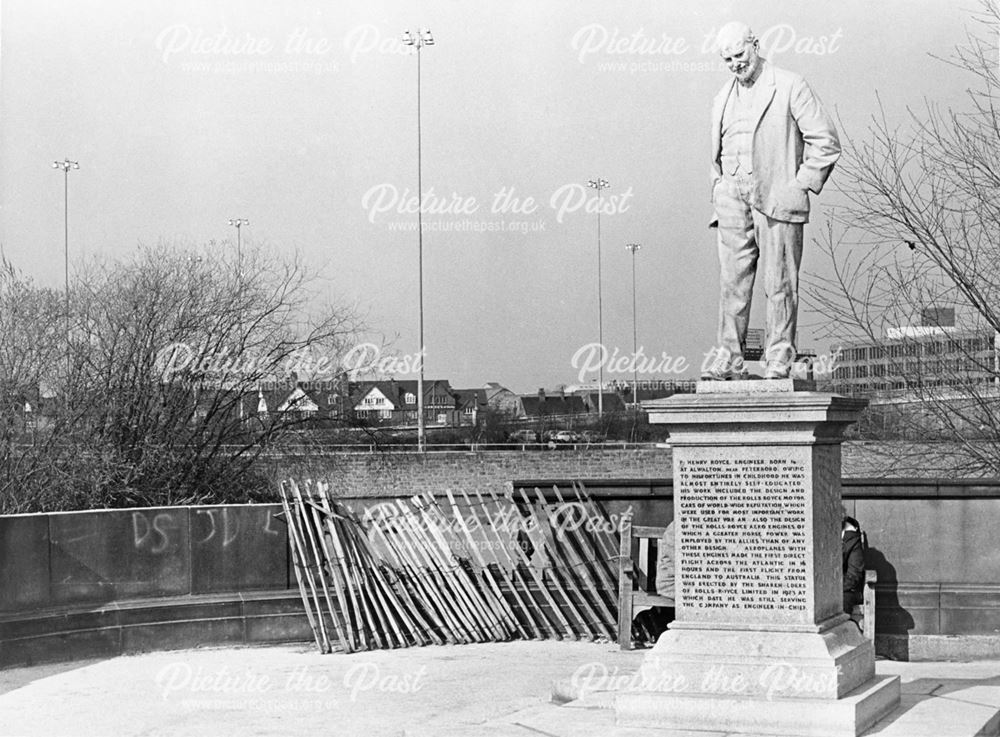 Statue of Henry Royce and vandal damage to parapet in the River Gardens