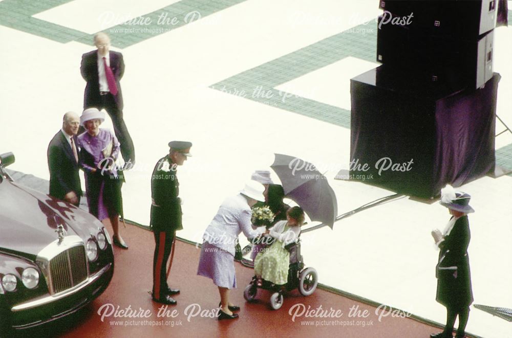 The Queen receiving flowers at the 'Derbyshire Celebrates' Pageant