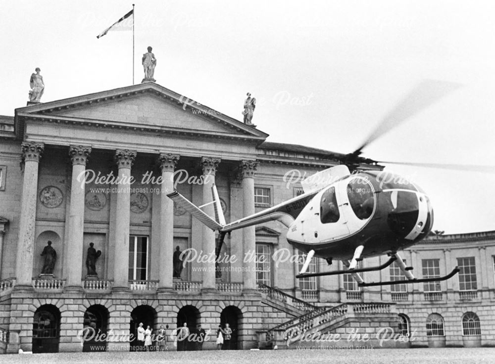 Helicopter airlift of Viscount and Lady Scarsdale at Kedleston Hall