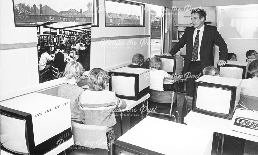Shelton Lock Junior School pupils working with computers
