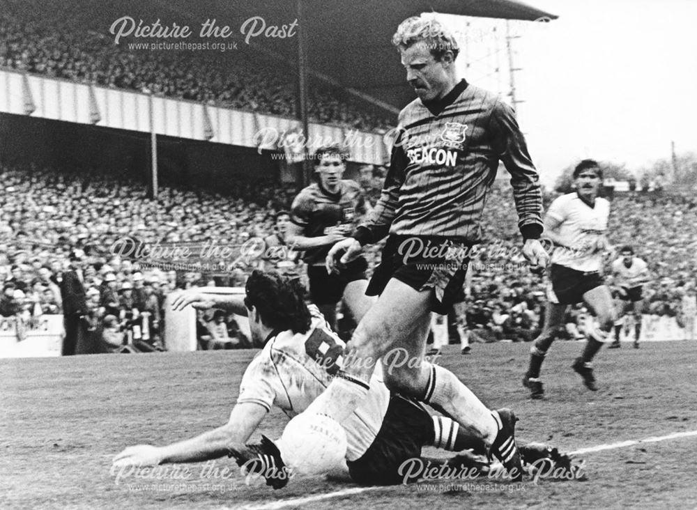 Derby County striker Bobby Davison on the floor at Plymouth, 1984