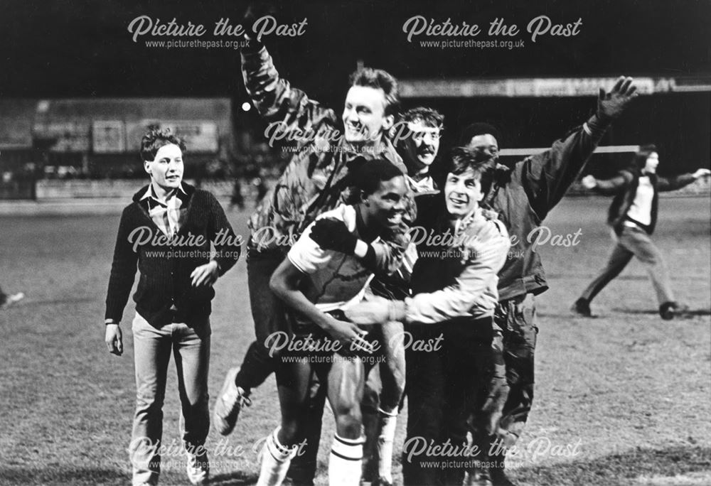 Derby County fans Celebrate with striker Calvin Plummer at Cambridge Utd, 1984