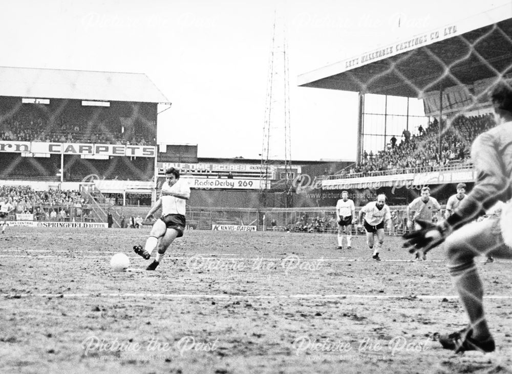 Derby County's John Robertson has his penalty saved