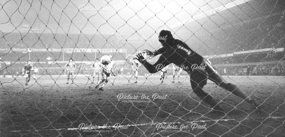 Derby County's Archie Gemmill scores from the penalty spot