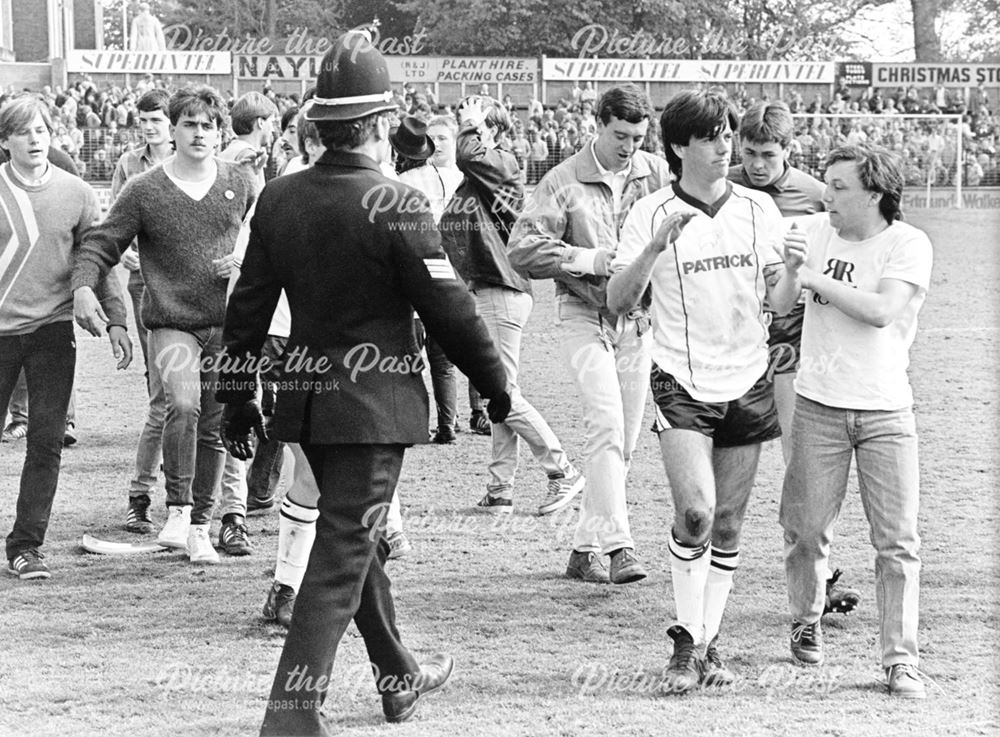 Steve Divine and Steve Cherry leave the ground after Derby County were relegated