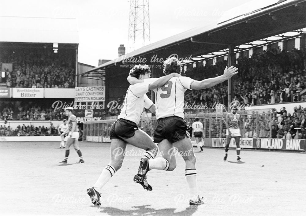 Bobby Davison congratulates Bobby Campbell after the Rams striker scored against Oldham Athletic