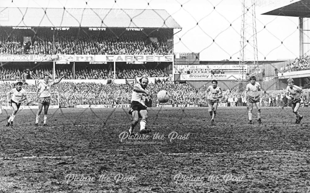 Archie Gemmill scores from the spot against Norwich City