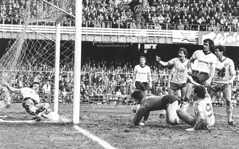 Derby goalkeeper Steve Cherry concedes a goal