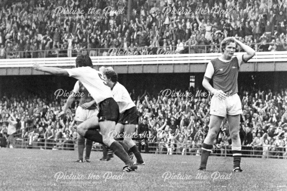 Derby County's John Duncan celebrates scoring against Arsenal