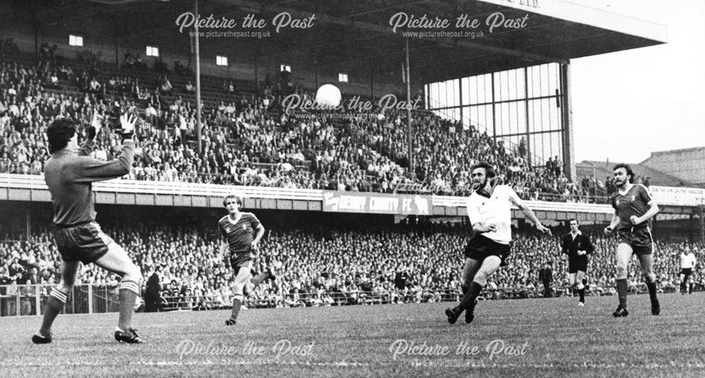 Derby County's Roy Greenwood tries a header against Middlesbrough