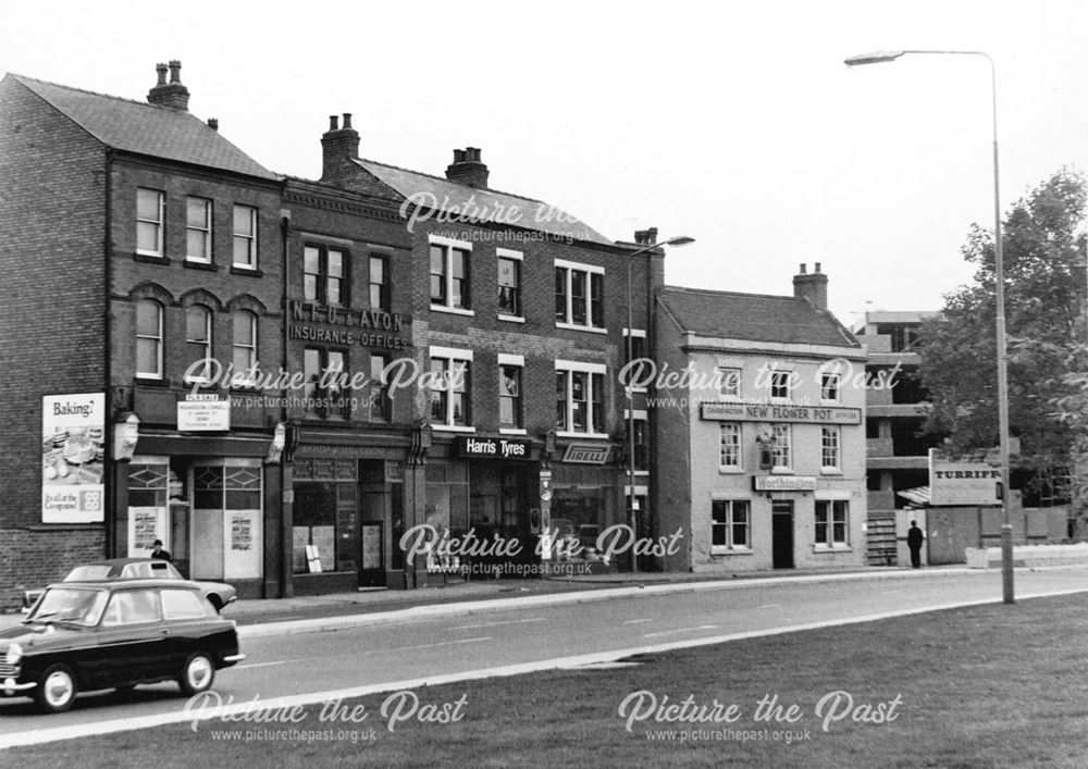 Shops, garage and the Flower Pot pub on King Street