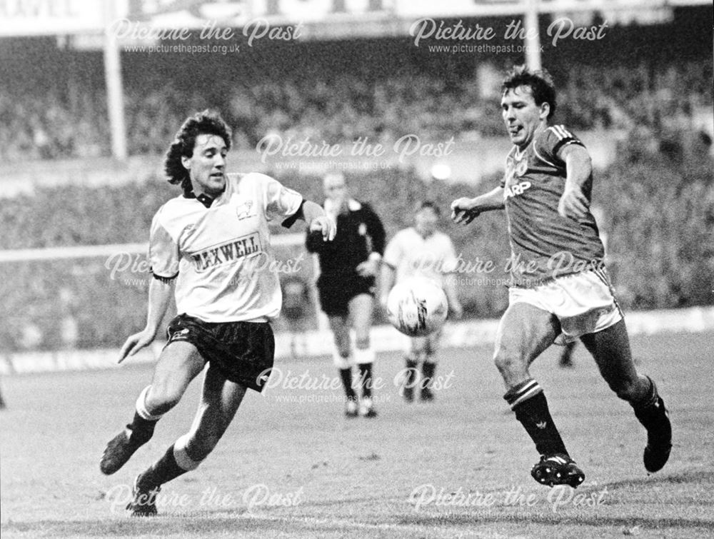 Derby County striker Dean Saunders in action v Man United