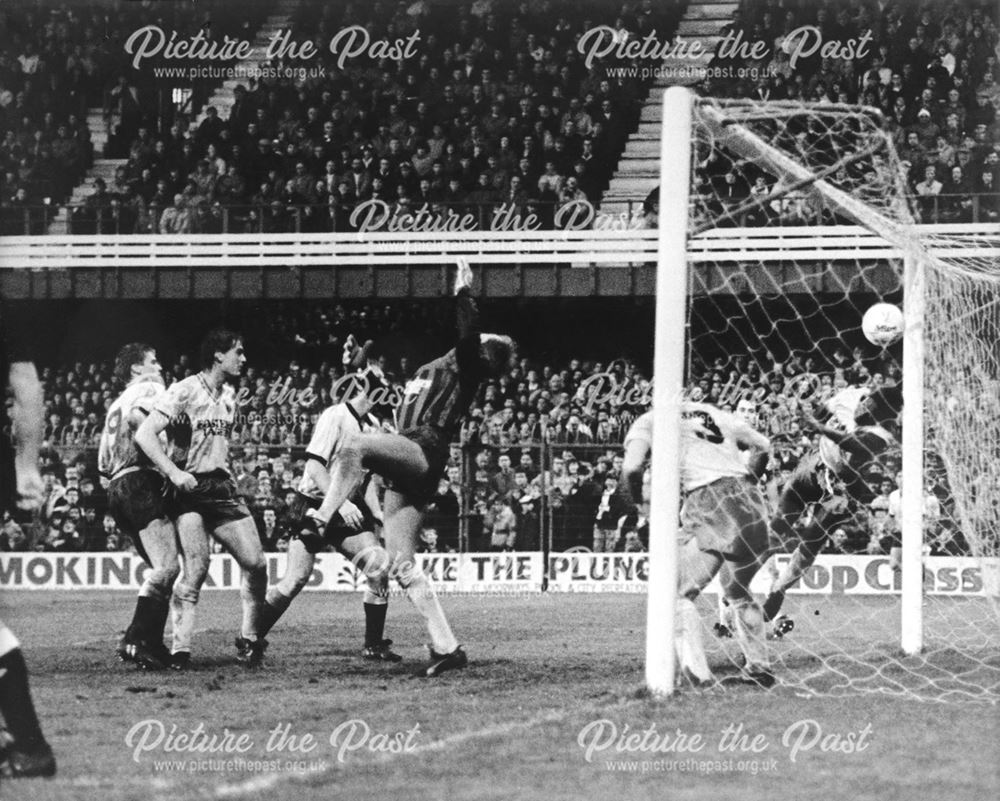 Derby County's Mark Wright scores