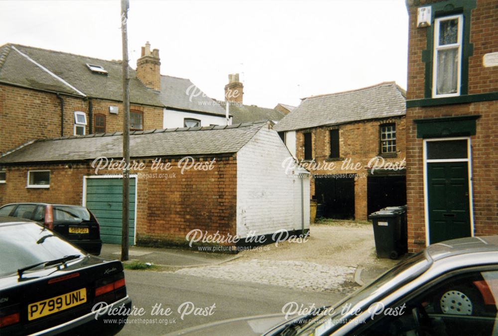 Coachhouse-Stables behind houses on Larges Street