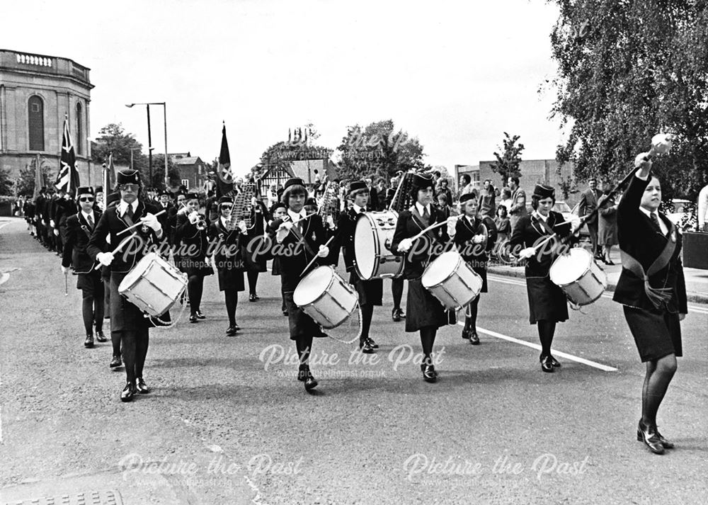 The Girls Brigade Band Lead the Parade Down Full Street