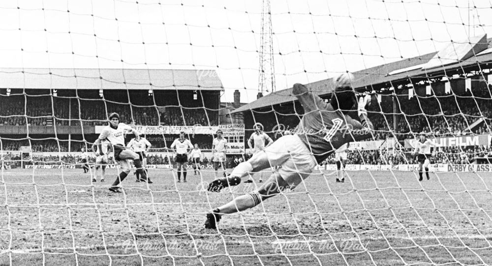 Derby County full back Keith Osgood scores