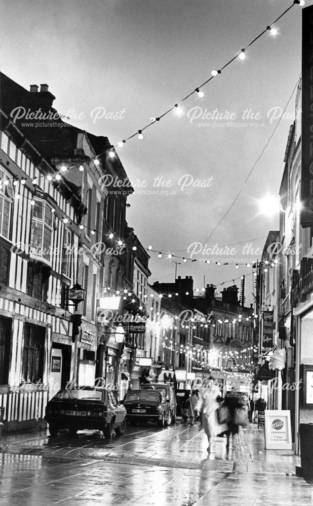 Christmas lights on Sadlergate at dusk