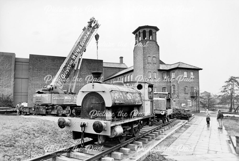 The placement of a small saddletank locomotive outside Derby Industrial Museum