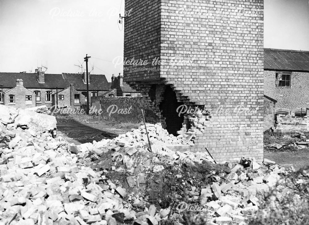 Stockbrook Street brickyard chimney during demolition