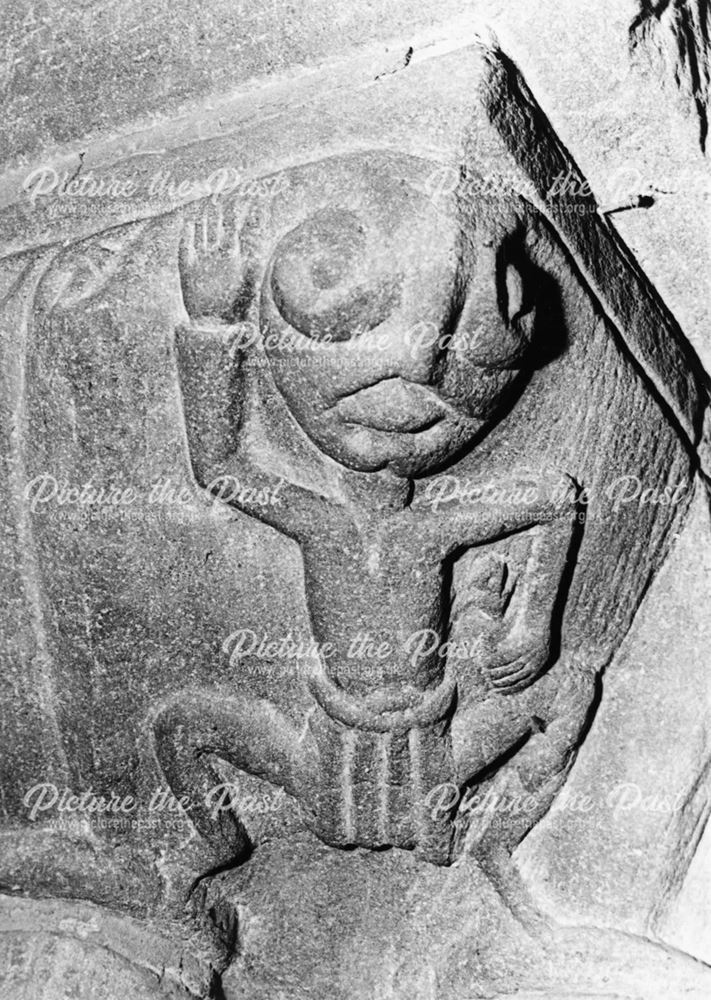 Saxon ? or Norman ? carved caricature, St Giles' Church, Normanton