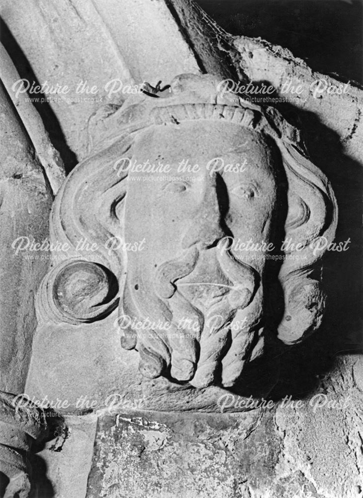 Norman carved figure head, St Giles' Church, Normanton