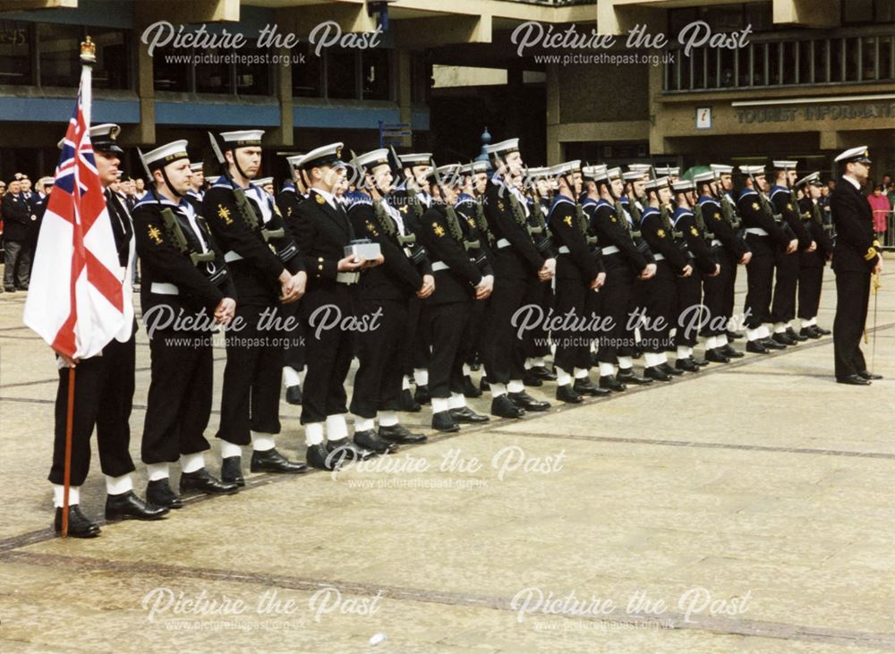 A parade in front of the Assembly Rooms during a Royal Navy and Royal Marines visit to Derby