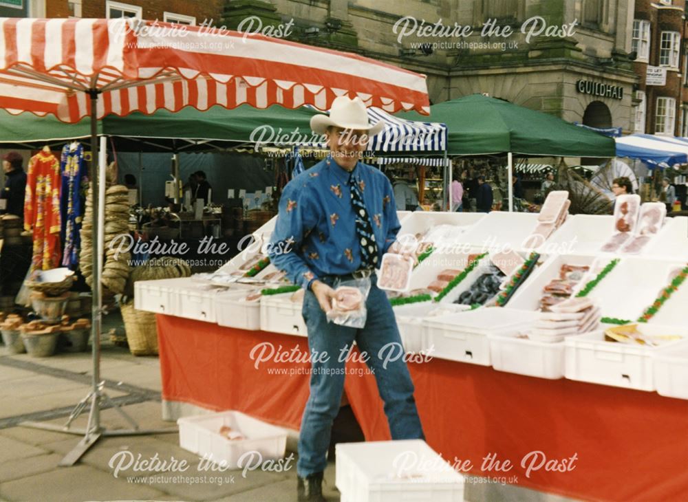 Continental Market butchers stall in the Market Place, Derby