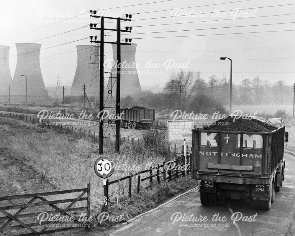 Cooling towers and coal delivery lorries at Spondon Power Station