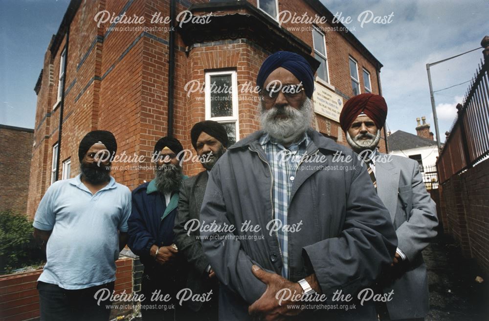 Sikh leaders outside the Sikh Community Centre