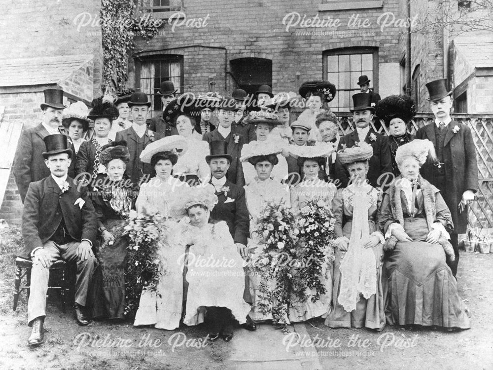 Wedding group photographed outside