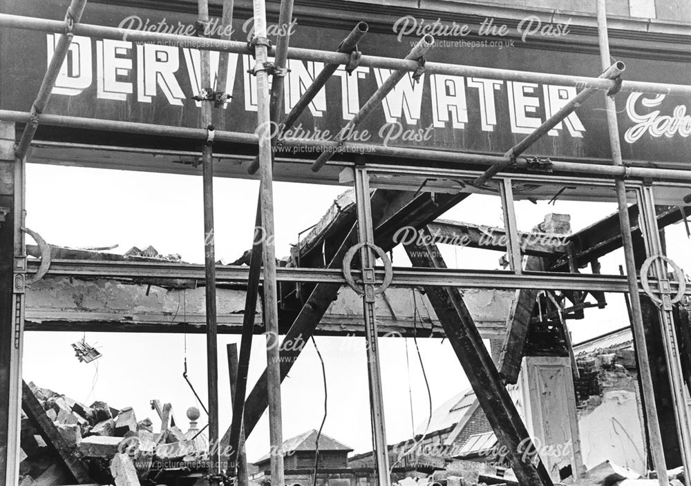 Demolition of Phillipson's showing old signage for Derwentwater Garden Centre