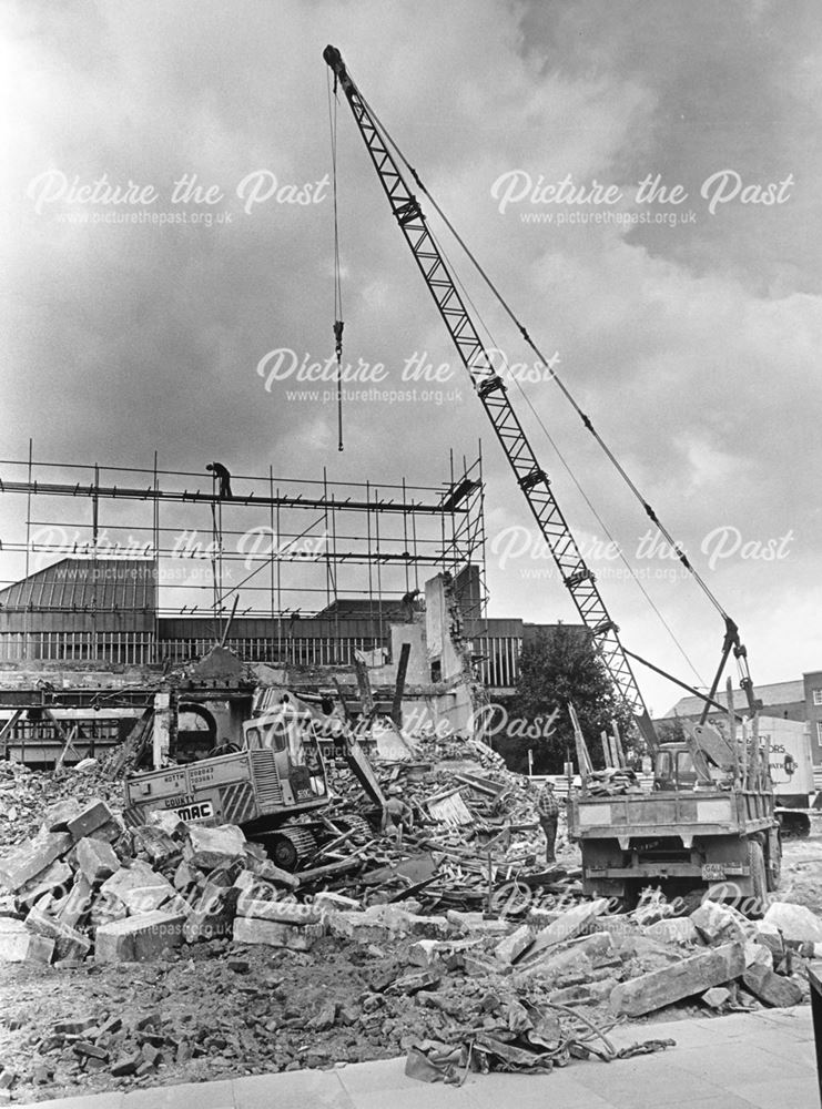 Demolition of Phillipson's showing a crane loading rubble towards the Assembly Rooms