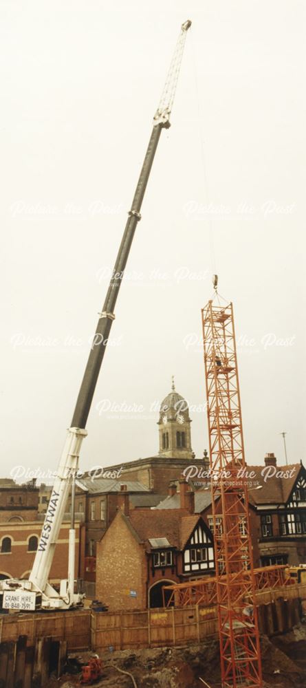 View showing a crane during construction of planned hotel site