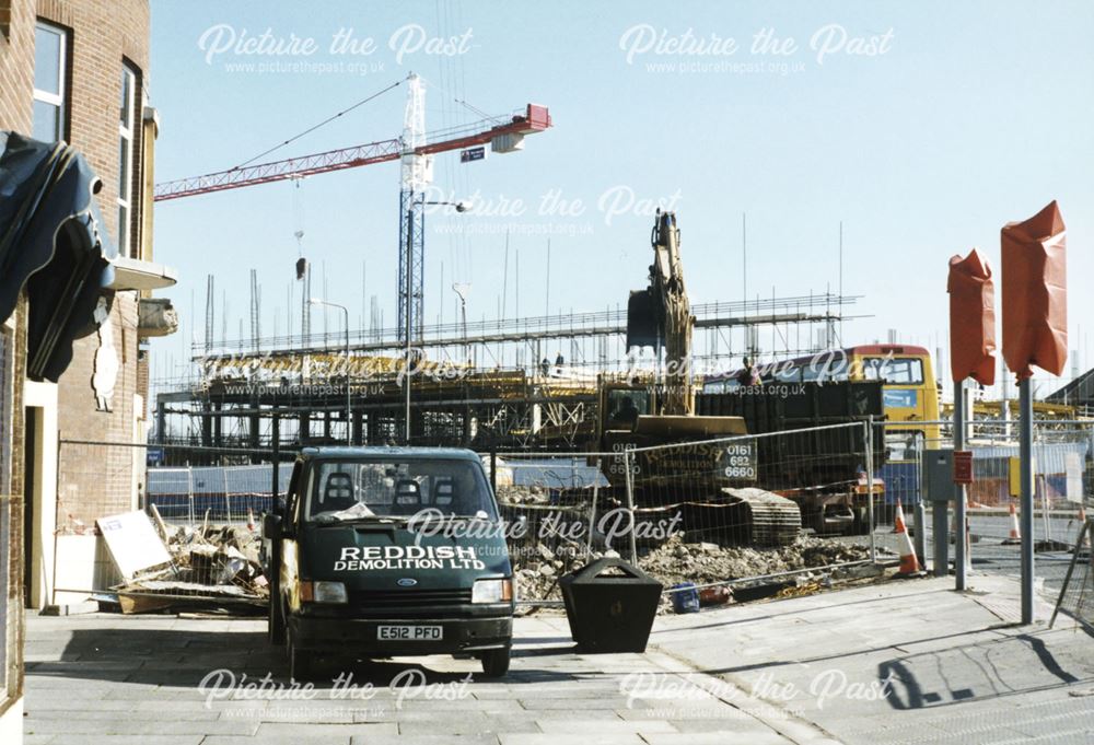 2 photographs showing the development of the Cock Pit Car Park and the Bus Station,Cock Pit Island