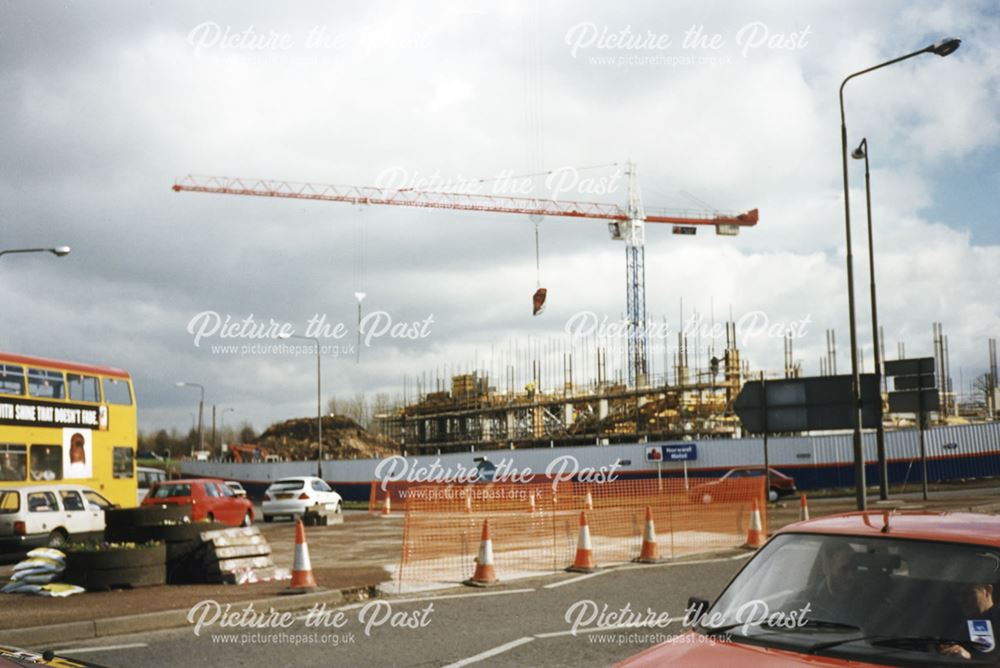 2 photographs showing the development of the Cock Pit Car Park,Cock Pit Island