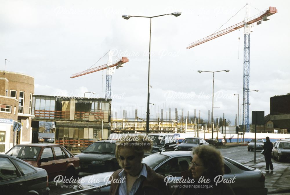 2 photographs showing the development of the Cock Pit Car Park and the Bus Station,Cock Pit Island