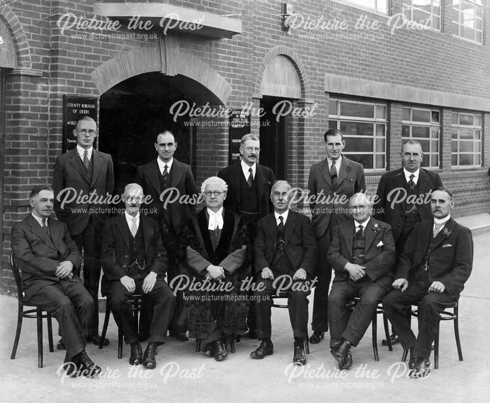 Officials seated at the Morledge Market