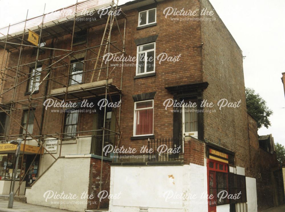 Property on Green Lane, showing 'Alf James Joke Shop' below