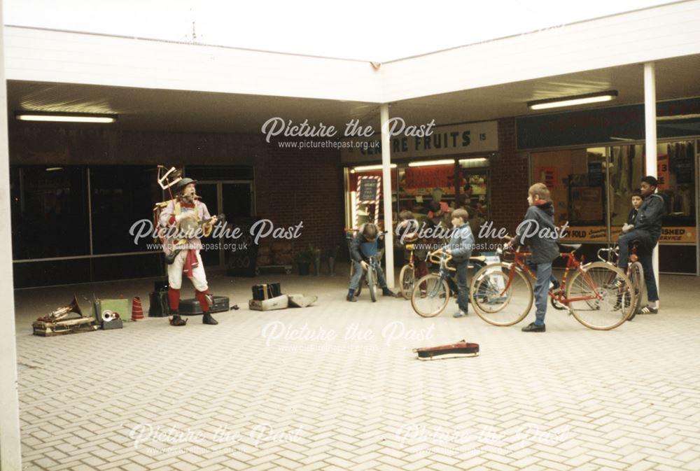 The opening of Sinfin Library. Bill Brookman - 'one man band' playing outside