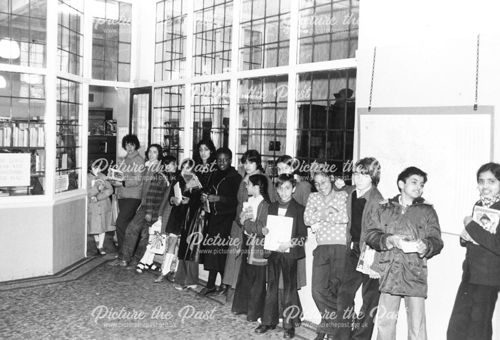 Children queue at Pear Tree Library