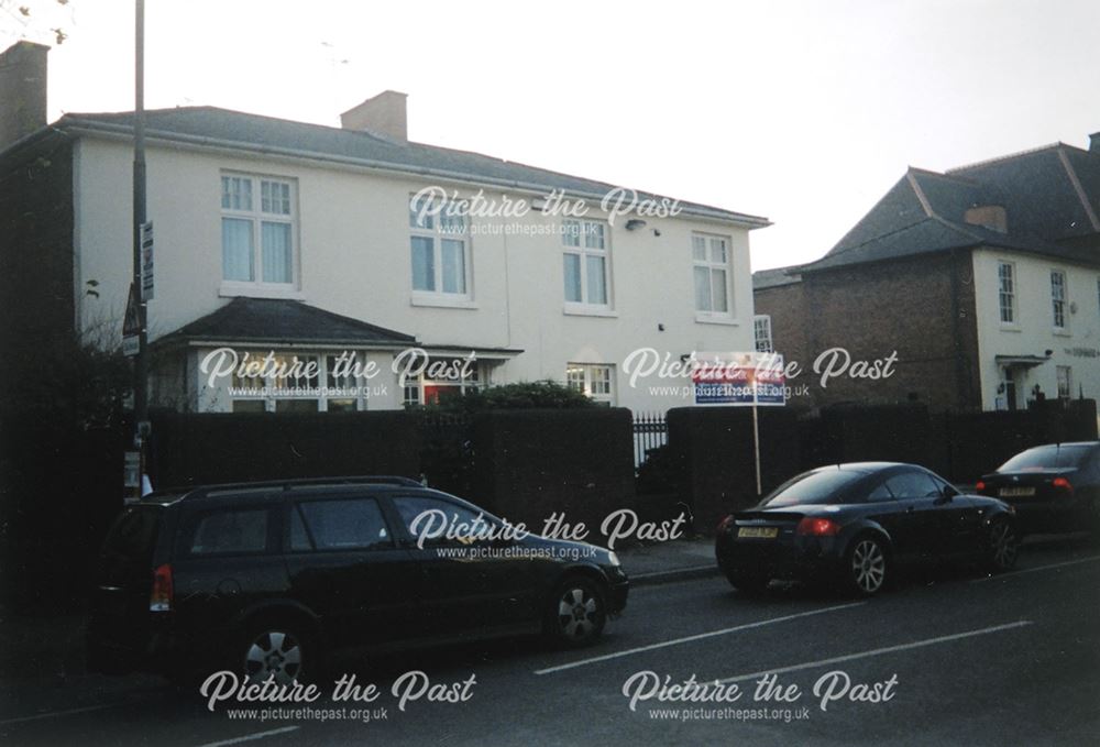 View showing houses on Ashbourne Road about to be demolished, 2004