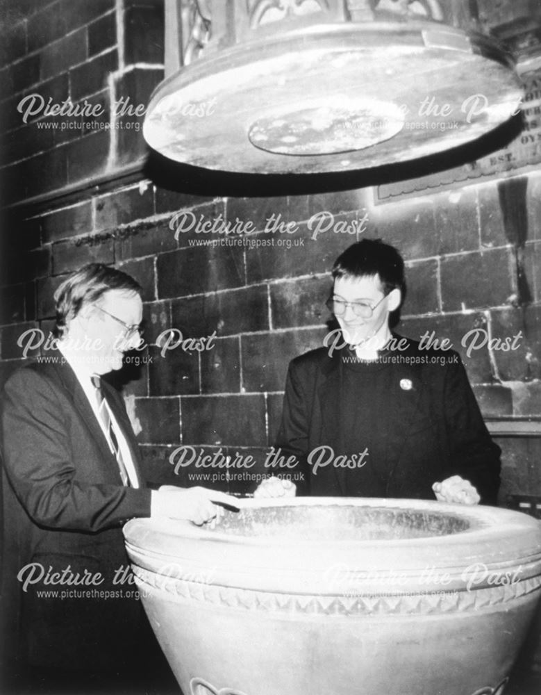 Clergy at St James font