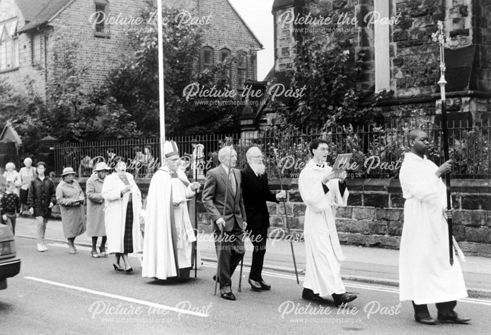 View of a procession leaving St James churchyard