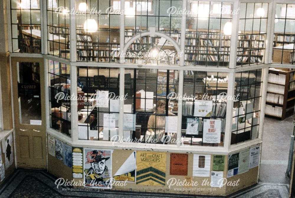 Pear Tree Library - Lady behind a window