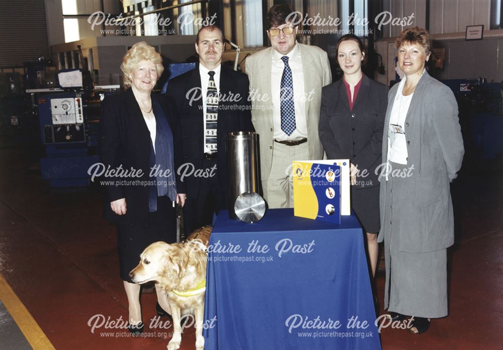 International Combustion Limited - Empty time capsule with representatives of companies involved beh