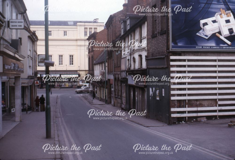 View of shops at bottom of Green Lane, looking onto Victoria Street