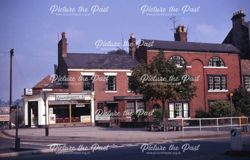 View of Friar Gate at the juction with Brick Street, with a launderette on the corner